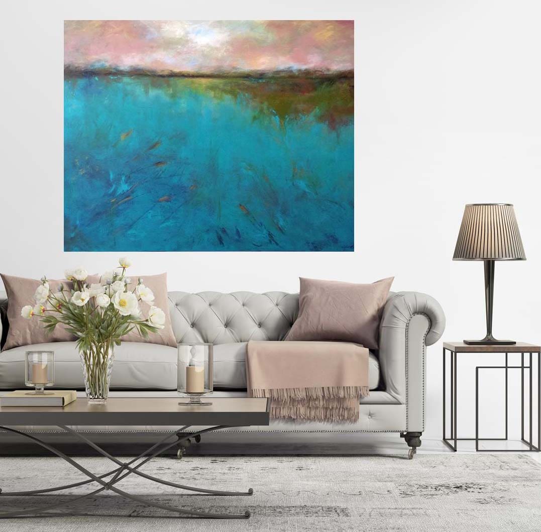 A painting of the ocean and sky is displayed in this living room.