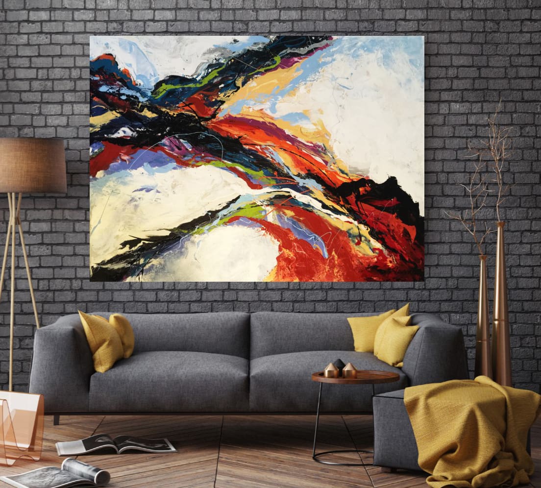 A painting of a colorful abstract scene in the middle of a brick wall.