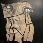 A painting of a woman 's face with broken glass.